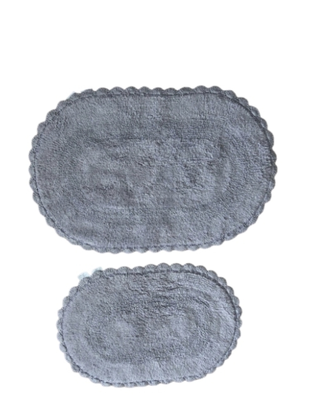 2-piece set of oval cotton bath rugs featuring a crochet border